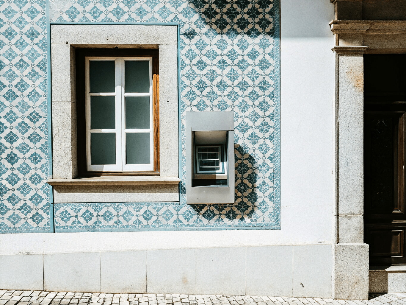 ATM built into a traditional Portuguese bank porch