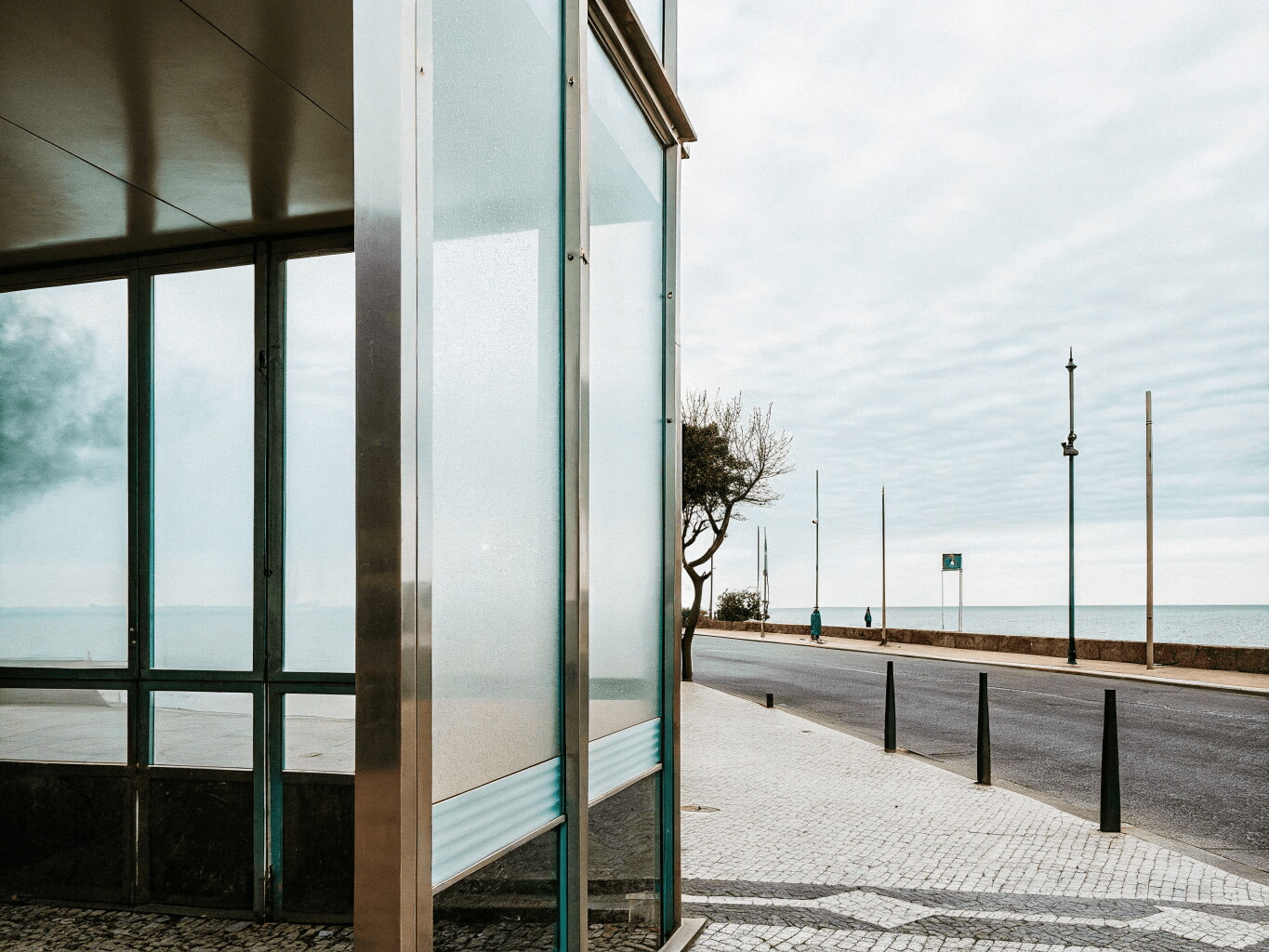 Modern bank with a large glass window on the street corner