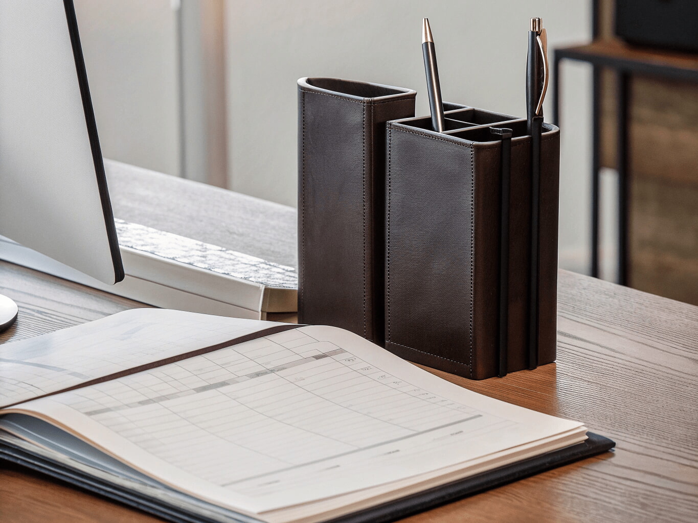 Desk with books on Portuguese tax law